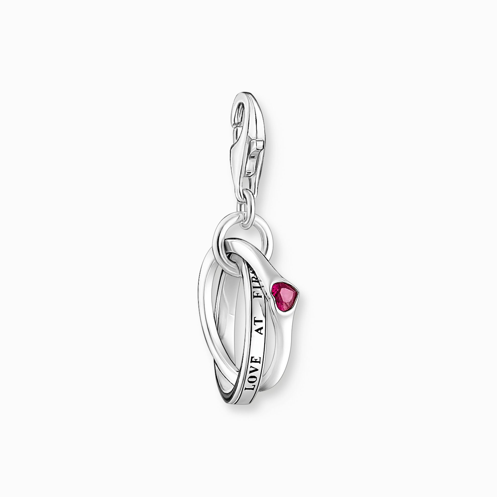 Silver charm pendant with two linked rings and a red stone from the Charm Club collection in the THOMAS SABO online store