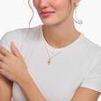 Cadena con ba&ntilde;o de oro y colgante de corazones entrelazados de la colección Charming Collection en la tienda online de THOMAS SABO