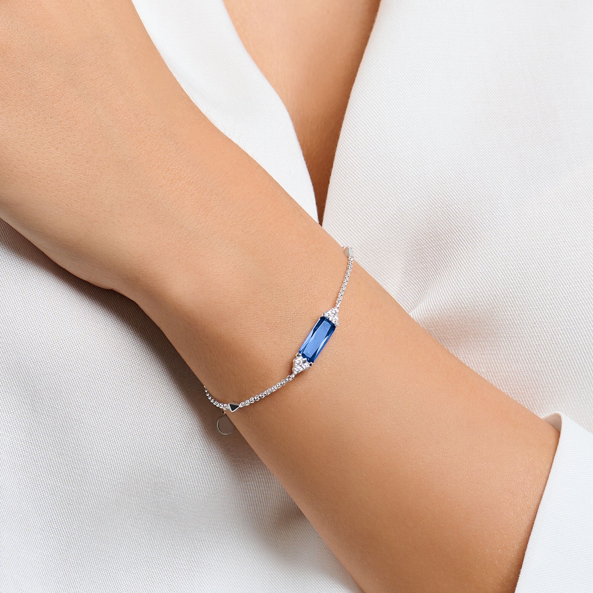 silver bracelet with blue stone