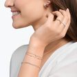 Armband med hj&auml;rtan och vita stenar ros&eacute;guld ur kollektionen Charming Collection i THOMAS SABO:s onlineshop