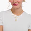 Cadena con ba&ntilde;o de oro y colgante de cruz blanca de la colección Charming Collection en la tienda online de THOMAS SABO