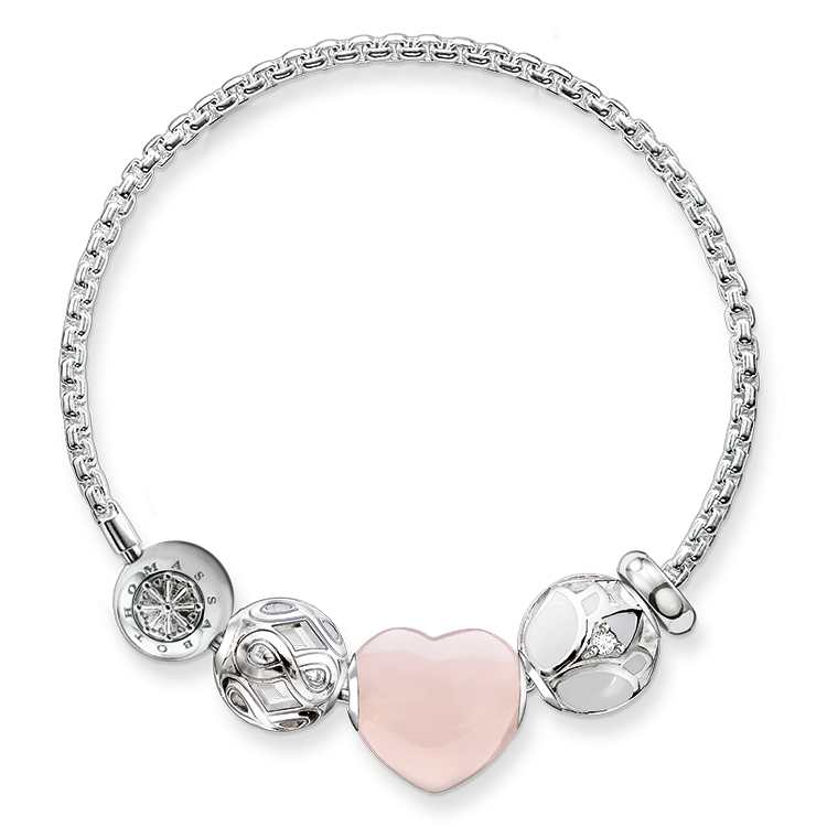 Zarte Kreation mit femininer Note: Zusammen mit dem Herz-Bead aus Rosenquarz sowie dem Infinity-Design wird der Lotosblüten-Bead am Karma-Armband zu einer Hommage an die Liebe. - 0